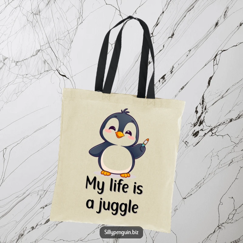 Funny Tote Bag: Penguin with a Cheerful Expression Spinning a Pen on its Flipper